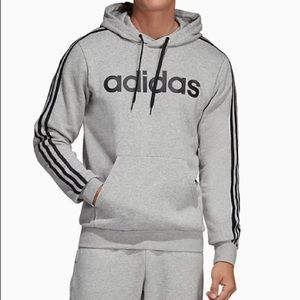Adidas hoodie with pockets and draw strings. Grey/Black. Mens size: Large